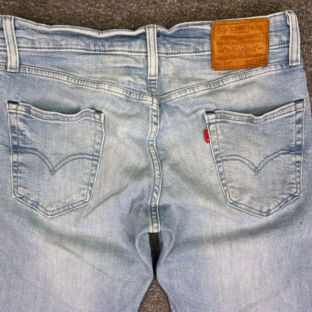 Levis Premium 511 Slim Jeans Mens 31x33 Light Wash Blue Casual Stretch Denim
